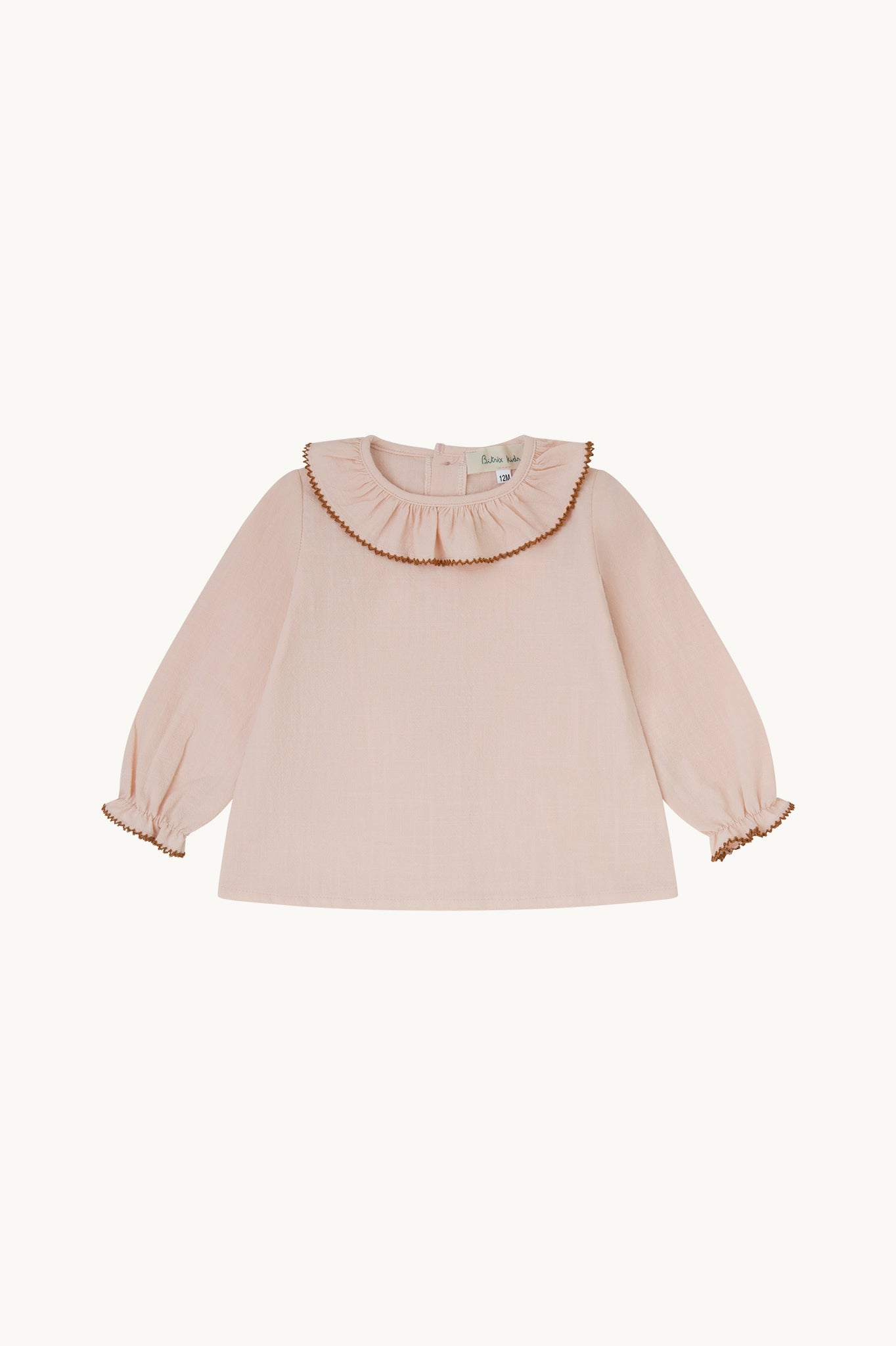 Blusa bebé rosa empolvado